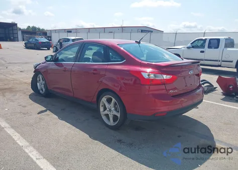 2013 Ford Focus Titanium z USA, uszkodzony, nr VIN 1FADP3J28DL380486